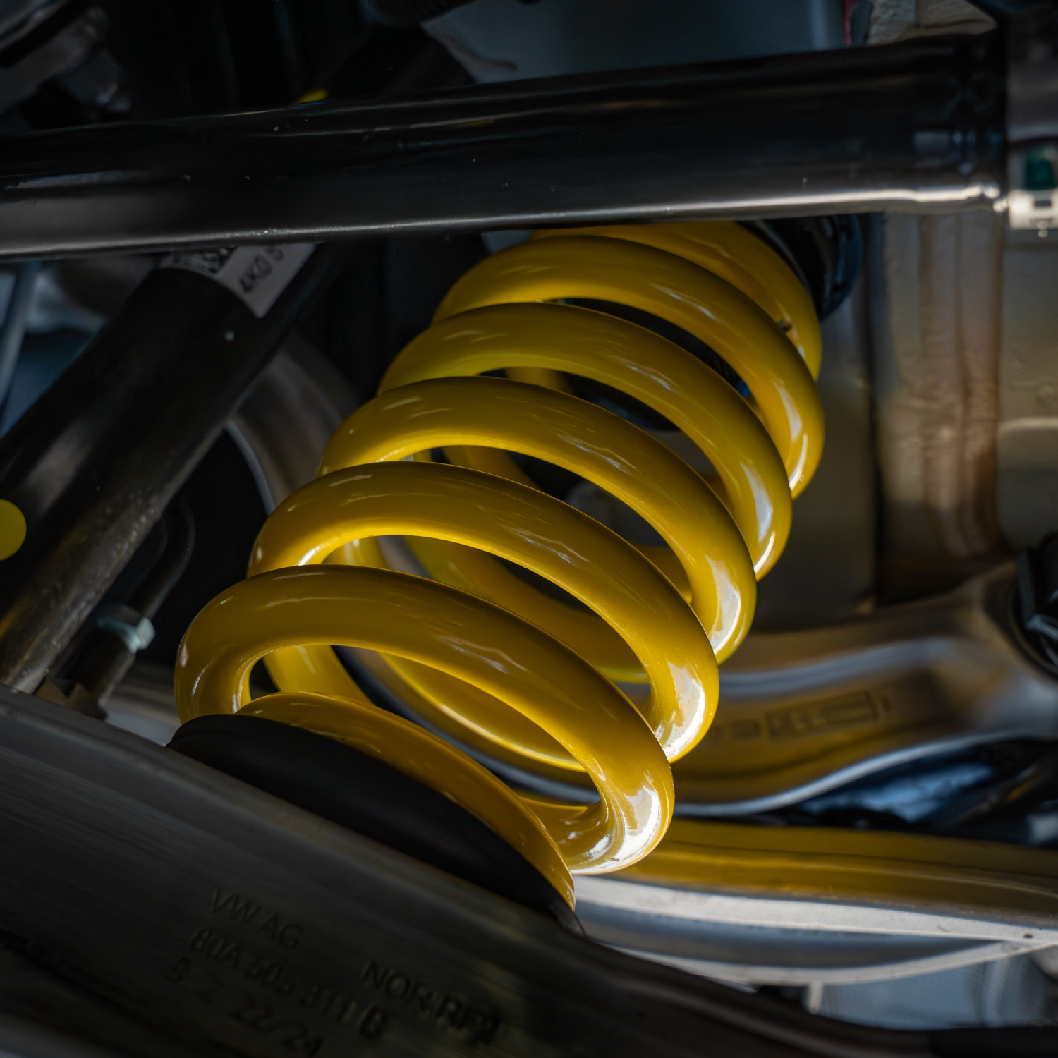 Close-up of yellow ABT suspension spring