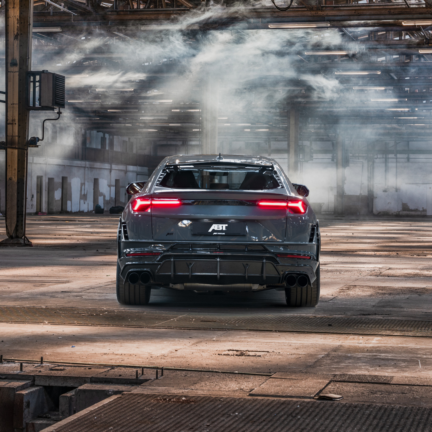 Blue Urus in warehouse from the rear view